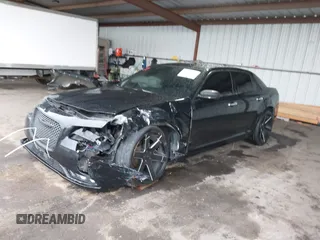 2016 Chrysler 300 with VIN 2C3CCAEG3GH348420, listed as a IAAI auction lot 41092322 with 111,929 mi miles. Bid and sale history available at carsss.com. Image 2.