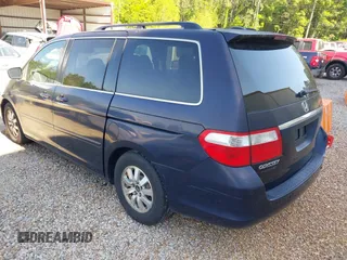 2007 Honda Odyssey Touring with VIN 5FNRL38807B023395, listed as a IAAI auction lot 42047062 with 240,552 mi miles. Bid and sale history available at carsss.com. Image 3.