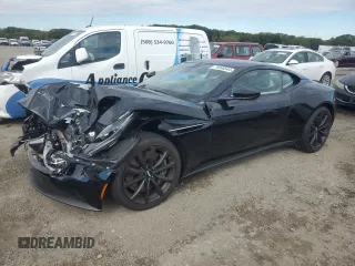 2017 Aston Martin DB11 z VIN SCFRMFAV5HGL02557, wystawiony jako Copart lot #74946544 z przebiegiem Nie podano mil oraz Szkody całkowita. Historia ofert i sprzedaży dostępna na DreamBid. Obrazek 1.
