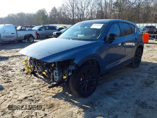 2021 Mazda CX-5 Touring with VIN JM3KFBCM8M0452700, listed as a IAAI auction lot 41490600 with 37,865 mi miles. Bid and sale history available at carsss.com. Image 18.