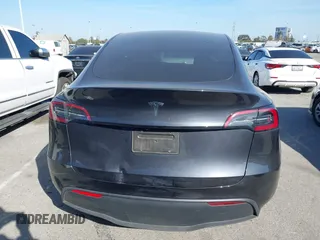 2025 Tesla Model Y Long Range with VIN 7SAYGDED2SF228414, listed as a IAAI auction lot 41706470 with 11,319 mi miles and . Bid and sale history available at DreamBid. Image 16.
