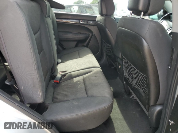 2013 Kia Sorento LX with VIN 5XYKT4A24DG339500, listed as a Copart auction lot 56302605 with 166,733 mi miles and Salvage title. Bid and sale history available at DreamBid. Image 11.