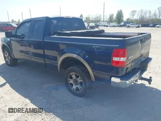 2005 Ford F-150 XLT with VIN 1FTPX14585NB29863, listed as a IAAI auction lot 42117501 with 305,480 mi miles. Bid and sale history available at carsss.com. Image 3.