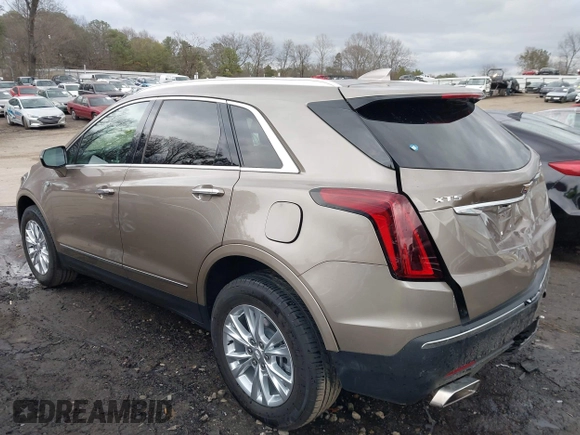 2023 Cadillac XT5 FWD Luxury z VIN 1GYKNAR45PZ140440, wystawiony jako IAAI lot #41723317 z przebiegiem 25 124 mil mil oraz . Historia ofert i sprzedaży dostępna na DreamBid. Obrazek 3.