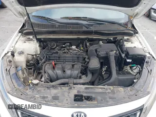 2015 Kia Optima LX with VIN KNAGM4A70F5644189, listed as a IAAI auction lot 42141090 with 140,346 mi miles. Bid and sale history available at carsss.com. Image 10.