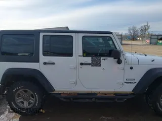 2017 Jeep Wrangler Unlimited Sport with VIN 1C4BJWDG2HL721379, listed as a IAAI auction lot 41314767 with 174,228 mi miles. Bid and sale history available at carsss.com. Image 13.