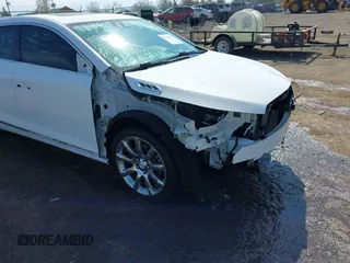 2014 Buick LaCrosse Premium I with VIN 1G4GD5G36EF304692, listed as a IAAI auction lot 41843897 with 65,774 mi miles and . Bid and sale history available at DreamBid. Image 6.