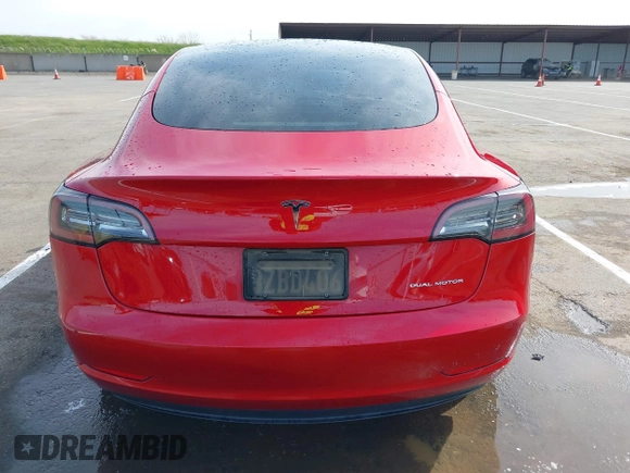 2021 Tesla Model 3 Long Range with VIN 5YJ3E1EB2MF015279, listed as a IAAI auction lot 41765428 with 55,486 mi miles. Bid and sale history available at carsss.com. Image 16.