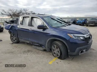 2020 Honda Ridgeline RTL-E with VIN 5FPYK3F71LB013551, listed as a Copart auction lot 37805883 with Not provided miles and . Bid and sale history available at DreamBid. Image 4.