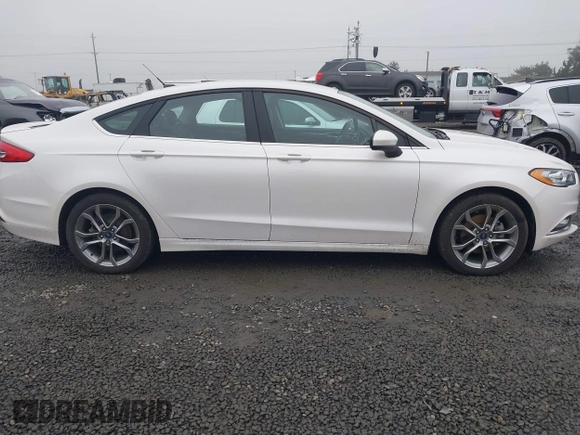 2017 Ford Fusion SE z VIN 3FA6P0H71HR201799, wystawiony jako IAAI lot #41346018 z przebiegiem 51 126 mil mil oraz . Historia ofert i sprzedaży dostępna na DreamBid. Obrazek 13.