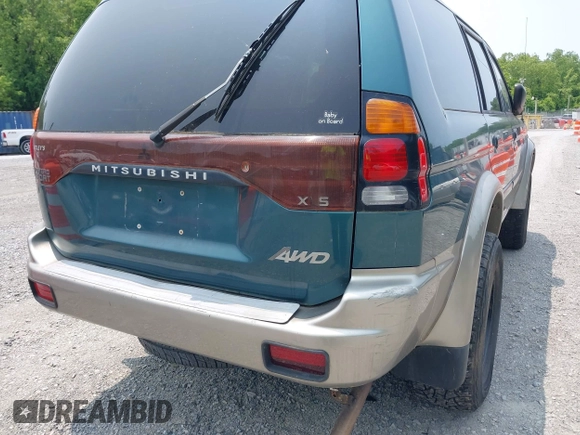 2004 Mitsubishi Montero XLS z VIN JA4MT31R34J007557, wystawiony jako IAAI lot #42368032 z przebiegiem 172 104 mil mil oraz . Historia ofert i sprzedaży dostępna na DreamBid. Obrazek 6.