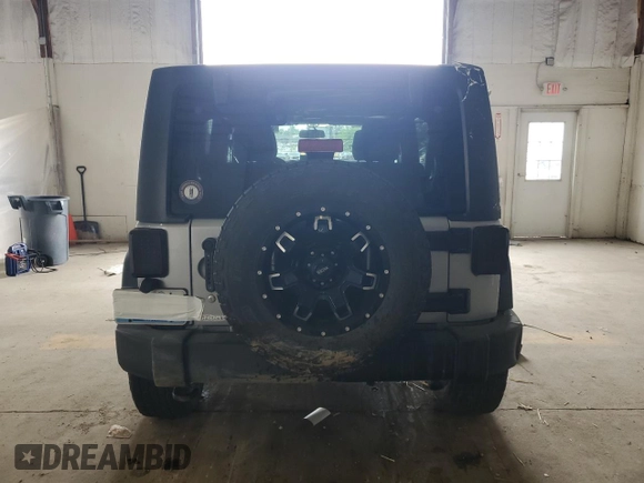 2018 Jeep Wrangler Unlimited Sport S with VIN 1C4HJWDG0JL938462, listed as a Copart auction lot 59862325 with 54,358 mi miles and Salvage title. Bid and sale history available at DreamBid. Image 6.