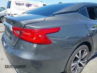 2018 Nissan Maxima Platinum z VIN 1N4AA6AP1JC388815, wystawiony jako IAAI lot #42098902 z przebiegiem 80 677 mil mil oraz . Historia ofert i sprzedaży dostępna na DreamBid. Obrazek 18.