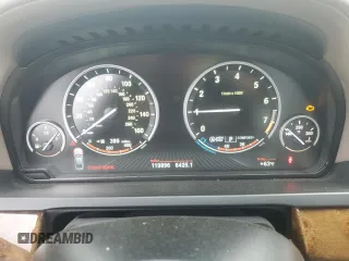2013 BMW 7 Series 740i with VIN WBAYA6C53DD143952, listed as a Copart auction lot 76064454 with 119,896 mi miles and Clean Title. Bid and sale history available at carsss.com. Image 9.