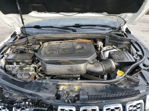 2021 Jeep Grand Cherokee Overland with VIN 1C4RJFCG1MC671472, listed as a Copart auction lot 86326714 with 103,760 mi miles and Salvage title. Bid and sale history available at DreamBid. Image 12.