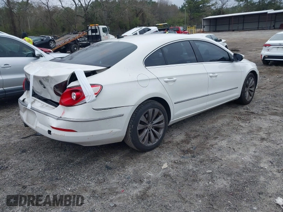 2010 Volkswagen CC Sport with VIN WVWML7AN5AE505256, listed as a IAAI auction lot 41870530 with 173,336 mi miles. Bid and sale history available at carsss.com. Image 4.