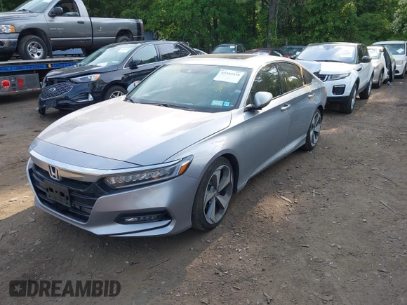 2020 Honda Accord Touring z VIN 1HGCV2F93LA017701, wystawiony jako IAAI lot #42383938 z przebiegiem 40 945 mil mil oraz . Historia ofert i sprzedaży dostępna na DreamBid. Obrazek 2.