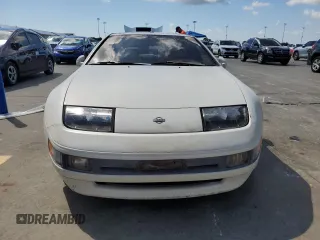 1991 Nissan 300ZX z VIN JN1RZ26H3MX504127, wystawiony jako Copart lot #74052424 z przebiegiem 48 904 mil mil oraz Szkody całkowita. Historia ofert i sprzedaży dostępna na DreamBid. Obrazek 5.