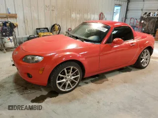 2008 Mazda MX-5 Miata Grand Touring z VIN JM1NC26F980145277, wystawiony jako Copart lot #89132085 z przebiegiem 162 829 mil mil oraz Szkoda całkowita • Salvage title. Historia ofert i sprzedaży dostępna na DreamBid. Obrazek 1.