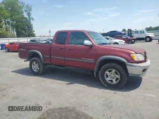2000 Toyota Tundra SR5 with VIN 5TBBT4411YS073843, listed as a Copart auction lot 52720675 with 197,512 mi miles and Salvage Title. Bid and sale history available at DreamBid. Image 4.