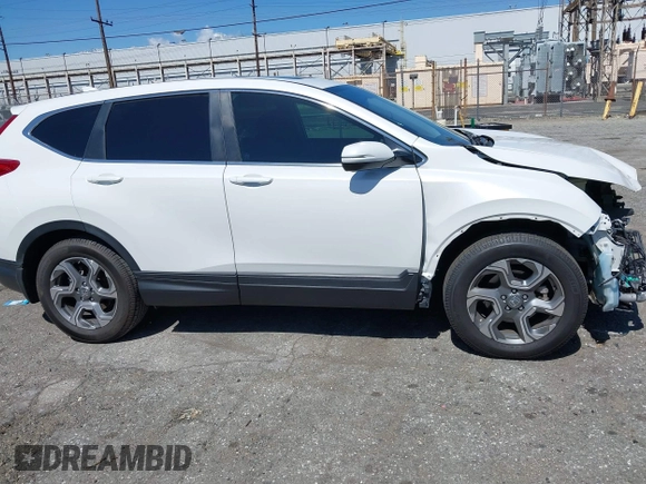 2019 Honda CR-V EX z VIN 5J6RW1H59KA012571, wystawiony jako IAAI lot #41830202 z przebiegiem 49 987 mil mil oraz . Historia ofert i sprzedaży dostępna na DreamBid. Obrazek 14.