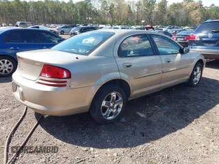 2002 Dodge Stratus z VIN 1B3AL56R62N154704, wystawiony jako IAAI lot #41879628 z przebiegiem 91 193 mil mil oraz . Historia ofert i sprzedaży dostępna na DreamBid. Obrazek 4.