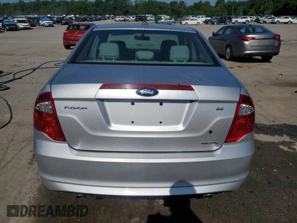 2012 Ford Fusion SE with VIN 3FAHP0HGXCR331498, listed as a Copart auction lot 61859325 with 61,445 mi miles and Salvage title. Bid and sale history available at DreamBid. Image 6.