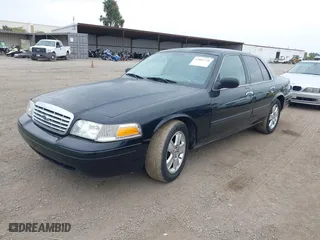 2011 Ford Crown Victoria LX with VIN 2FABP7EV0BX147267, listed as a IAAI auction lot 42052728 with 177,034 mi miles. Bid and sale history available at carsss.com. Image 2.