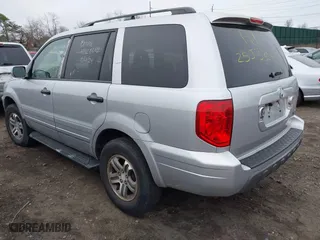 2004 Honda Pilot EX with VIN 2HKYF18494H525047, listed as a IAAI auction lot 41927610 with 999,999 mi miles. Bid and sale history available at carsss.com. Image 3.