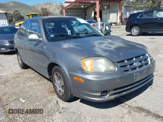 2005 Hyundai Accent GLS with VIN KMHCG35C25U348410, listed as a IAAI auction lot 41729780 with 166,216 mi miles. Bid and sale history available at carsss.com. Image 1.