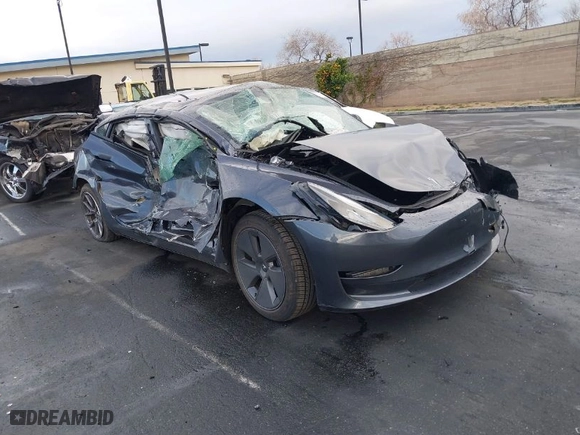 2023 Tesla Model 3 with VIN 5YJ3E1EA6PF408858, listed as a IAAI auction lot 41739383 with 1 mi miles. Bid and sale history available at carsss.com. Image 1.
