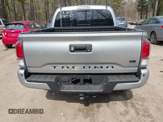 2022 Toyota Tacoma SR with VIN 3TMCZ5ANXNM497511, listed as a IAAI auction lot 41670710 with 26,277 mi miles and . Bid and sale history available at DreamBid. Image 16.