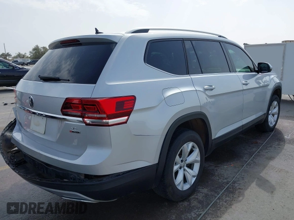 2018 Volkswagen Atlas SE with VIN 1V2KR2CA7JC546436, listed as a IAAI auction lot 41739327 with 123,916 mi miles and . Bid and sale history available at DreamBid. Image 4.