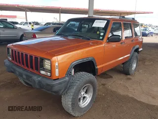 1997 Jeep Cherokee Sport with VIN 1J4FJ68SXVL517077, listed as a IAAI auction lot 42350553 with Not provided miles and . Bid and sale history available at DreamBid. Image 2.