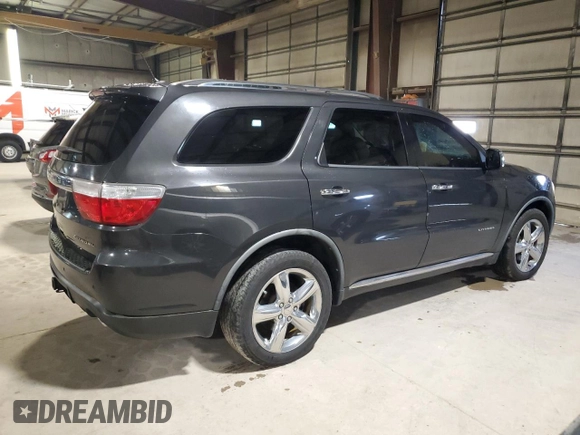 2011 Dodge Durango Citadel with VIN 1D4SE5GT4BC613797, listed as a Copart auction lot 54893175 with 196,840 mi miles and Salvage title. Bid and sale history available at DreamBid. Image 3.