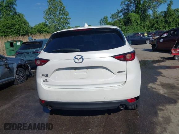 2018 Mazda CX-5 Grand Touring z VIN JM3KFBDM8J0420422, wystawiony jako IAAI lot #42188348 z przebiegiem 102 216 mil mil oraz . Historia ofert i sprzedaży dostępna na DreamBid. Obrazek 17.