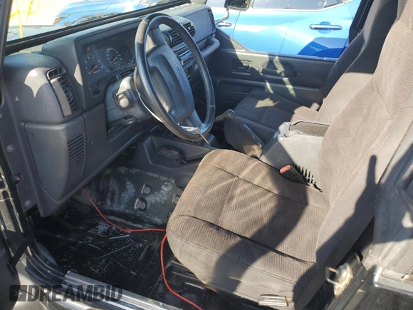 2003 Jeep Wrangler X with VIN 1J4FA39S73P340698, listed as a Copart auction lot 73888624 with 49,677 mi miles and Salvage Title. Bid and sale history available at carsss.com. Image 7.