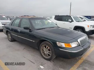 2002 Mercury Grand Marquis LS Premium z VIN 2MEFM75WX2X626520, wystawiony jako IAAI lot #42374203 z przebiegiem 139 692 mil mil oraz . Historia ofert i sprzedaży dostępna na DreamBid. Obrazek 1.