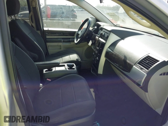 2010 Dodge Grand Caravan SXT with VIN 2D4RN5D15AR196651, listed as a IAAI auction lot 42105957 with 244,374 mi miles and . Bid and sale history available at DreamBid. Image 5.