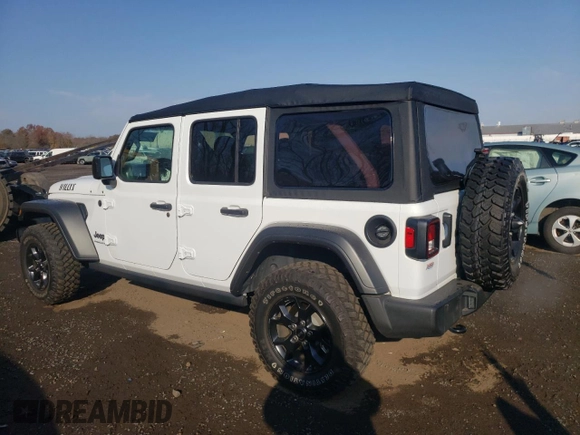 2023 Jeep Wrangler Willys with VIN 1C4HJXDG5PW543450, listed as a Copart auction lot 78455624 with 30,595 mi miles and Salvage Title. Bid and sale history available at DreamBid. Image 2.
