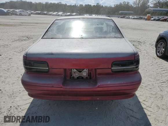 1995 Chevrolet Caprice z VIN 1G1BL52W7SR137278, wystawiony jako Copart lot #74446544 z przebiegiem Nie podano mil oraz Szkoda całkowita • Salvage title. Historia ofert i sprzedaży dostępna na DreamBid. Obrazek 6.