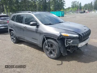 2018 Jeep Cherokee Latitude with VIN 1C4PJMCBXJD601328, listed as a IAAI auction lot 42303389 with 98,288 mi miles and . Bid and sale history available at DreamBid. Image 1.