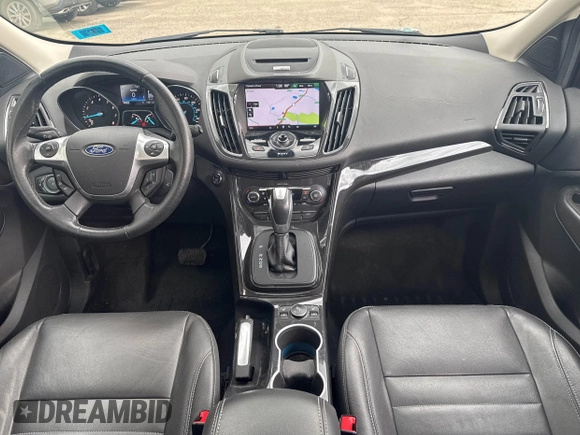 2014 Ford Escape Titanium with VIN 1FMCU9J94EUC63638, listed as a IAAI auction lot 42196241 with 198,112 mi miles and . Bid and sale history available at DreamBid. Image 6.