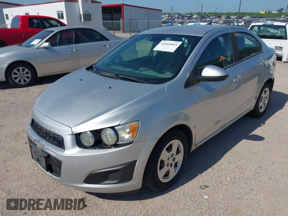 2013 Chevrolet Sonic LS with VIN 1G1JA5SH1D4246936, listed as a IAAI auction lot 42665664 with 124,464 mi miles and . Bid and sale history available at DreamBid. Image 2.