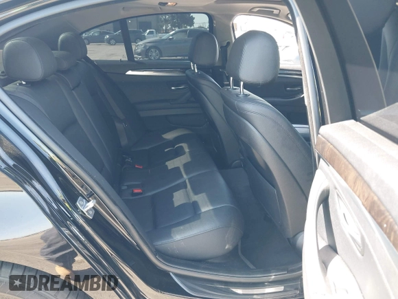 2015 BMW 5 Series 528i with VIN WBA5A5C51FD516003, listed as a IAAI auction lot 42386713 with 105,317 mi miles and . Bid and sale history available at DreamBid. Image 8.