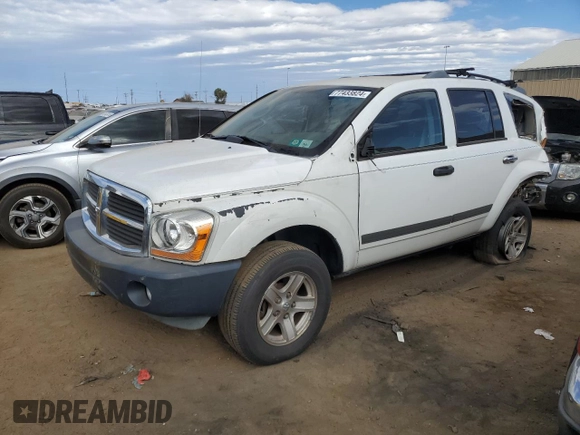 2006 Dodge Durango SLT with VIN 1D4HD48286F104619, listed as a Copart auction lot 77433824 with 221,631 mi miles and Salvage title. Bid and sale history available at DreamBid. Image 1.