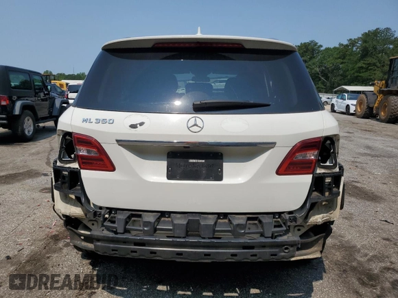 2015 Mercedes-Benz M 350 with VIN 4JGDA5JB7FA592524, listed as a Copart auction lot 58702095 with 109,977 mi miles and Salvage title. Bid and sale history available at DreamBid. Image 6.