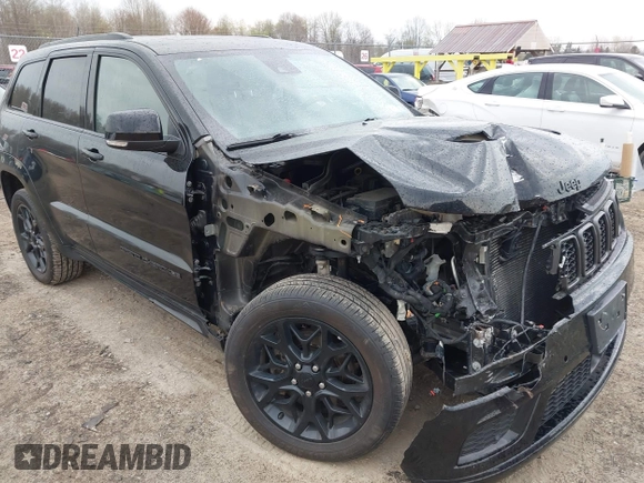 2021 Jeep Grand Cherokee 80th Anniversary with VIN 1C4RJFBG7MC828116, listed as a IAAI auction lot 42118355 with 57,240 mi miles and . Bid and sale history available at DreamBid. Image 1.