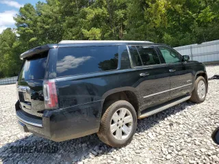 2015 GMC Yukon XL Denali with VIN 1GKS1JKJ1FR295572, listed as a Copart auction lot 65498084 with 150,167 mi miles and Clean Title. Bid and sale history available at carsss.com. Image 3.