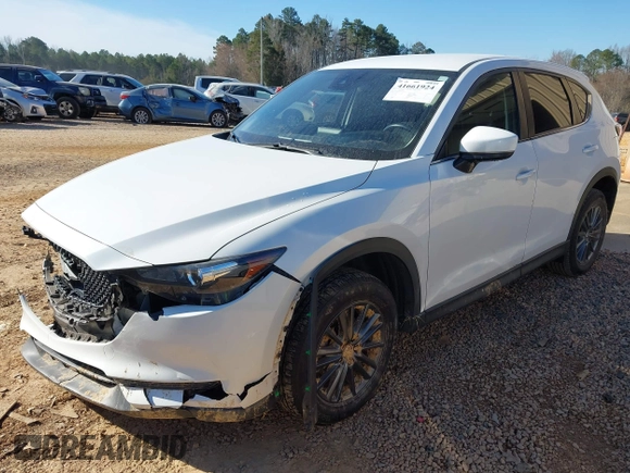 2019 Mazda CX-5 Sport with VIN JM3KFBBM0K0574255, listed as a IAAI auction lot 41661924 with 93,851 mi miles and . Bid and sale history available at DreamBid. Image 17.